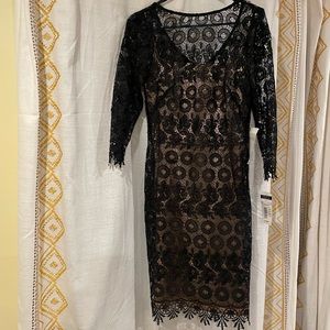 Beautiful black dress with champagne slip